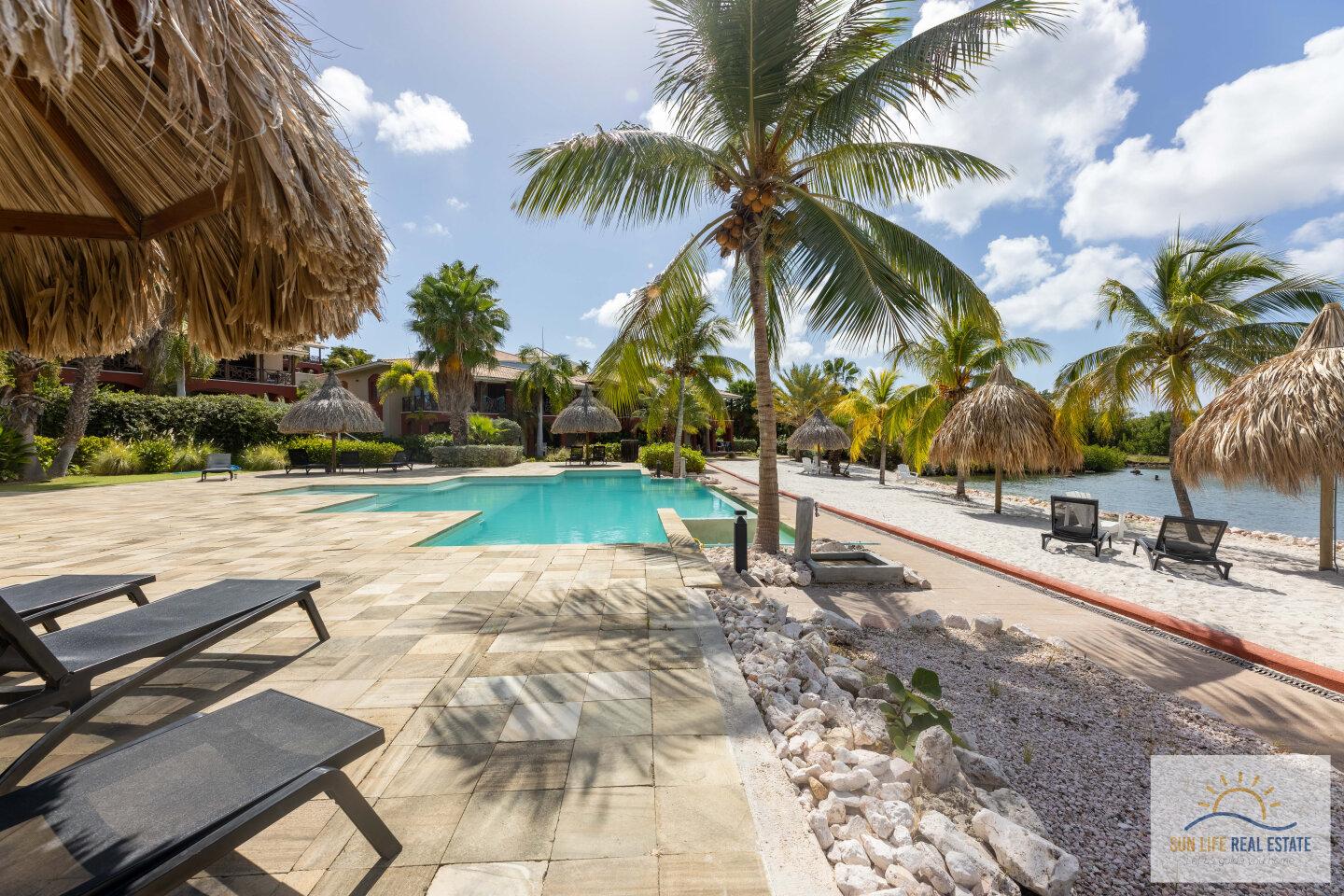 Waterfront Apartment with Private Beach  for Sale on Spanish Water Resort